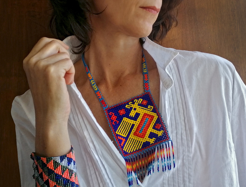 Woman wearing traditional huichol beading jewerly