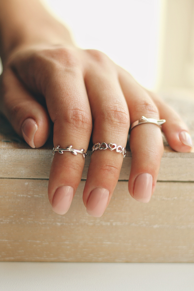 Tender jewerly on female hand, close up shot