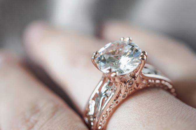 woman hand with jewelry diamond ring on finger